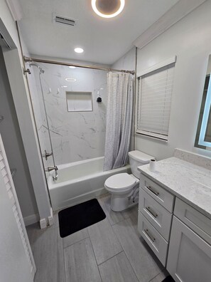 Shower, hair dryer, towels, soap - 4 Bedroom 2 Bath Modern Remodeled House in Clearwater Florida (Clearwater)