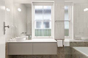 Apartment | Bathroom | Bathtub, towels - Family Home in Mayfield With Stylish Interior (Newcastle)