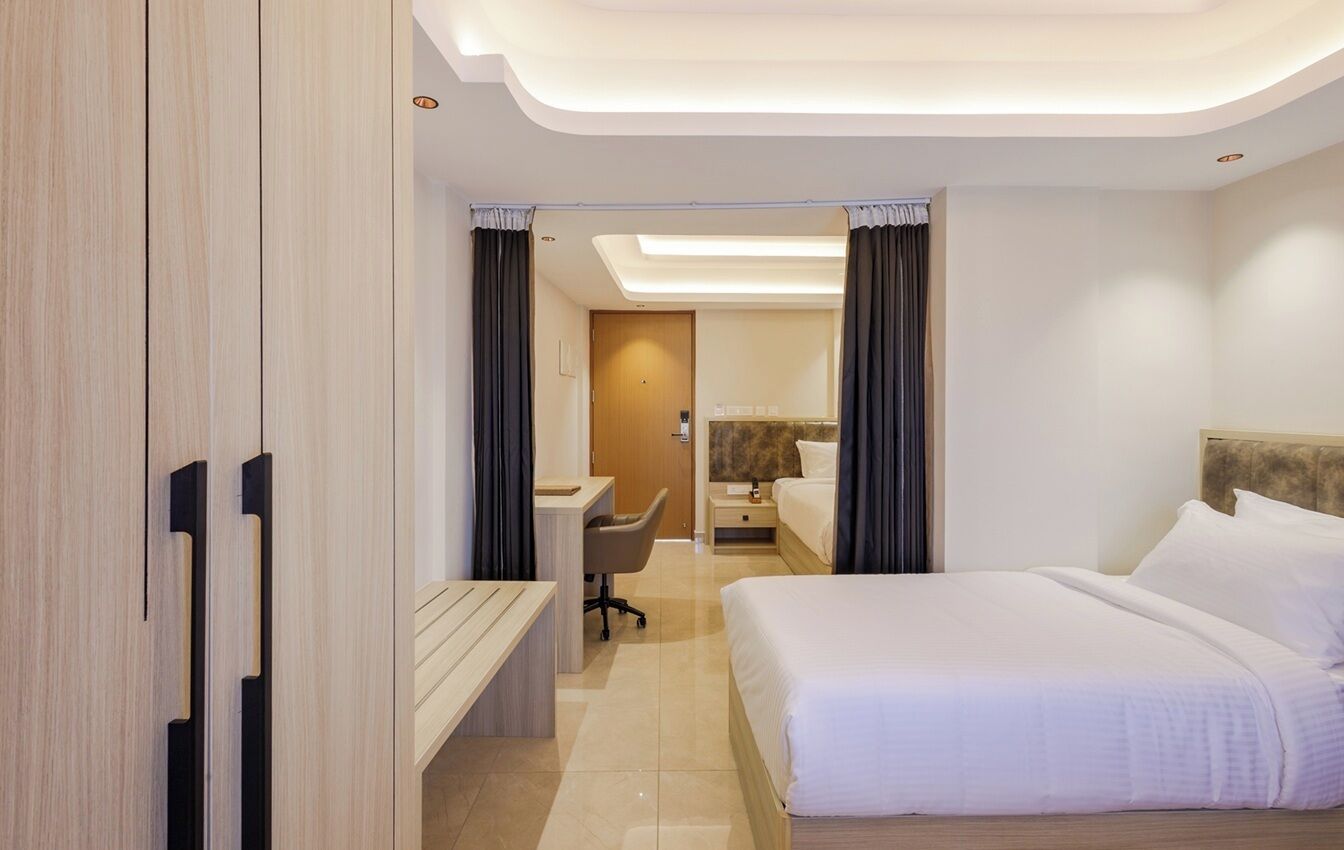 Family Suite, City View | Desk, laptop workspace, iron/ironing board, free WiFi