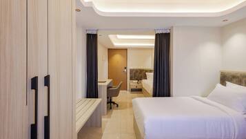 Family Suite, City View | Desk, laptop workspace, iron/ironing board, free WiFi