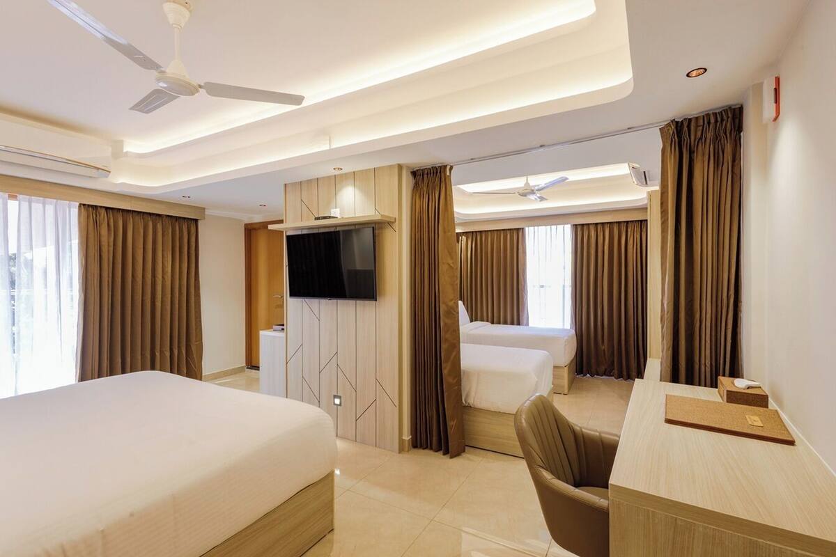 Family Suite, City View | Desk, laptop workspace, iron/ironing board (on request), free WiFi