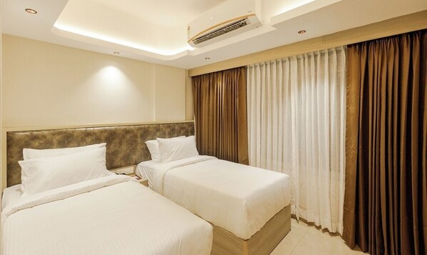 Classic Twin Room, Balcony, City View | Desk, laptop workspace, iron/ironing board, free WiFi