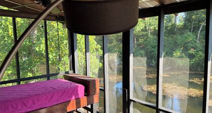 Cabin on secluded horse farm with stocked pond.