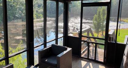 Cabin on secluded horse farm with stocked pond.