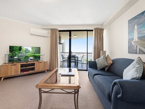 Apartment | Living room | Flat-screen TV - Beachside Retreat in Urangan Mantra Resort (Hervey Bay)