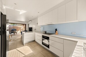 Apartment | Private kitchen | Cookware/dishes/utensils - 2-bed Beach Escape With Courtyard (Gold Coast)