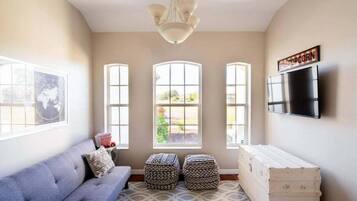 Smart TV, fireplace, books