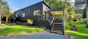 Tranquil space with sounds of stream and native bird life.