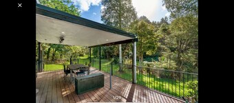 Tranquil space with sounds of stream and native bird life.