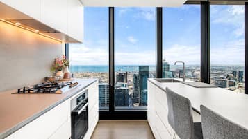 Apartment | Private kitchen | Cleaning supplies
