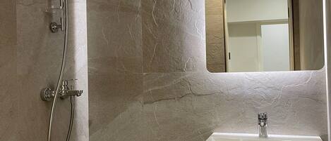 Shower, free toiletries, hair dryer, towels