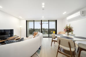Apartment | Living area - Sleek Inner-city 2-bed With Swimming Pool & BBQ (Canberra)