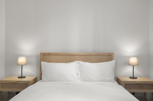Departamento | 1 habitación, tabla de planchar con plancha y ropa de cama