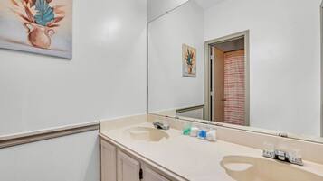 Hair dryer, towels, soap, shampoo