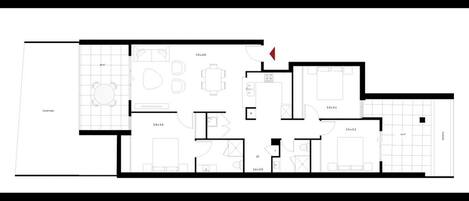 A floor plan of a hotel with a courtyard, multiple bedrooms, a dining area, and a kitchen.