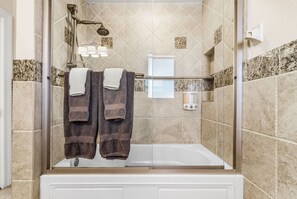 Shower, hair dryer, towels