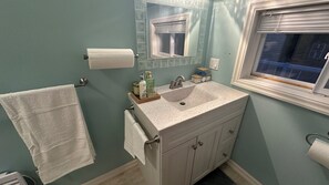 Hair dryer, towels, soap, shampoo