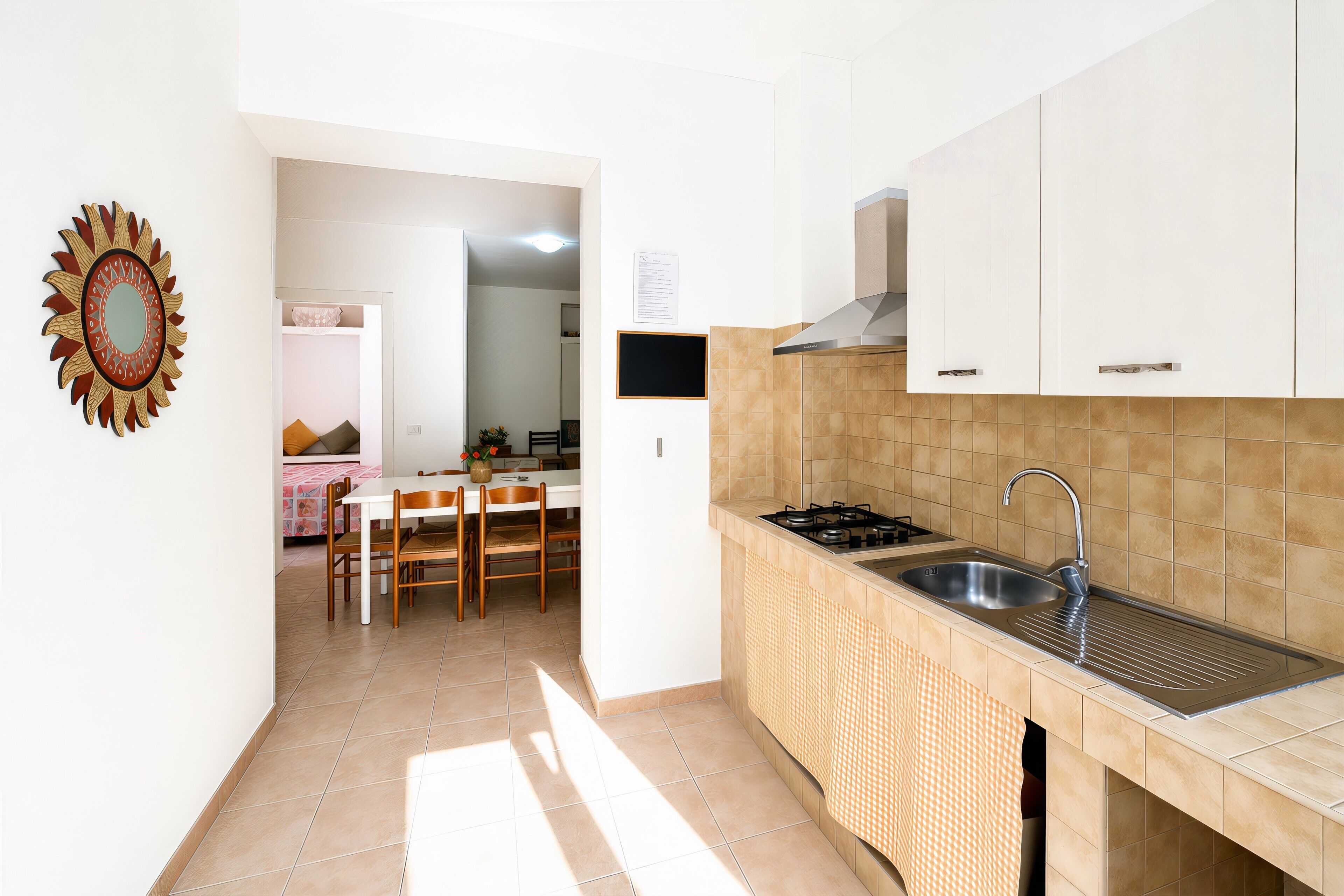 Coffee/tea maker, fridge, stovetop, high chair