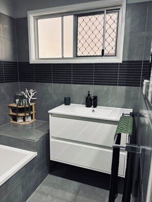 Hair dryer, towels, soap, toilet paper