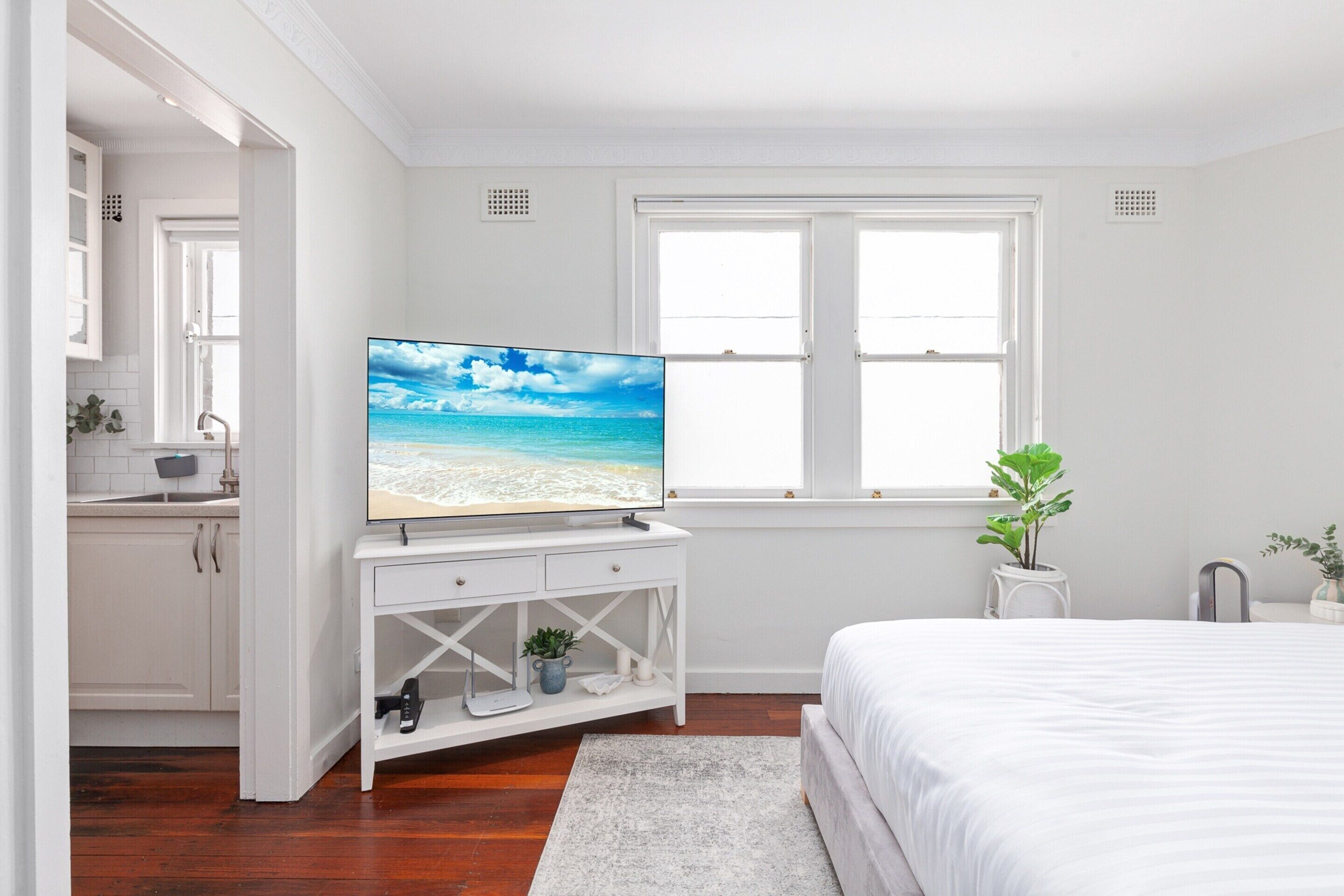 Casa | 1 dormitorio, tabla de planchar con plancha, ropa de cama