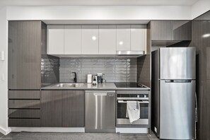 Apartment | Private kitchen | Fridge, microwave, oven, stovetop