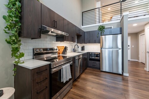 Elevate Your Stay in Our Stunning Loft with 17-Foot Ceilings