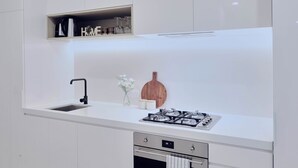 Fridge, microwave, oven, stovetop - KozyGuru | Box Hill | Chic and Close to It All (Box Hill)