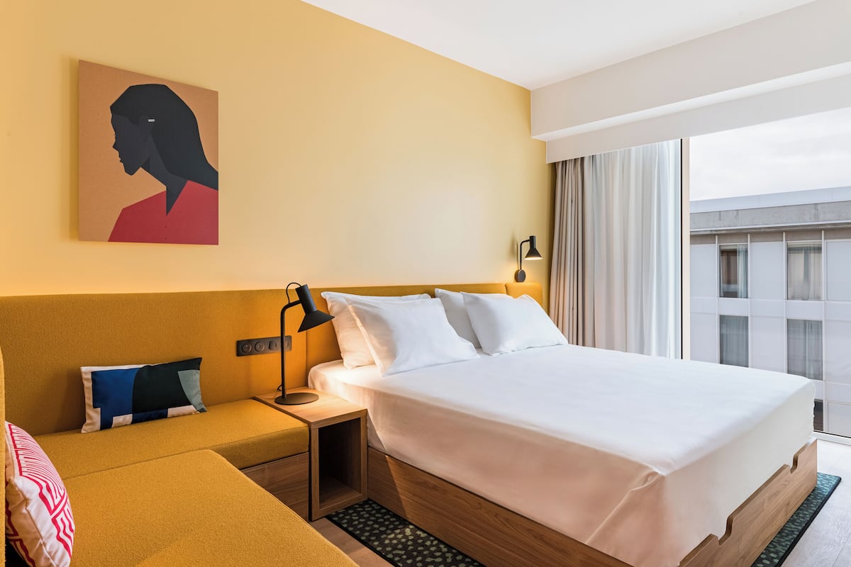 Luxe beddengoed, donsdekens, pillowtop-bedden, een kluis op de kamer