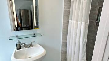 Hair dryer, towels, soap, shampoo