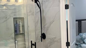 Shower, towels, soap, shampoo