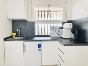 Fridge, microwave, coffee/tea maker