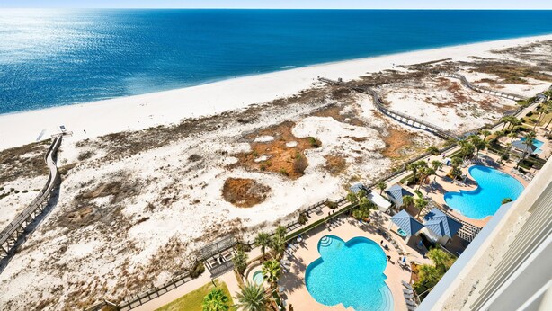 A resort with a beach view, a pool area, and a boardwalk. - Beach Club B1805 Pools-54-ft balcony K/K/K/K/Bonus room with Q & Tw-XL Sleeps 11 (Gulf Shores)