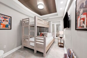 4 bedrooms, desk, iron/ironing board, travel cot
