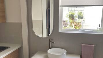 Shower, towels, soap, shampoo