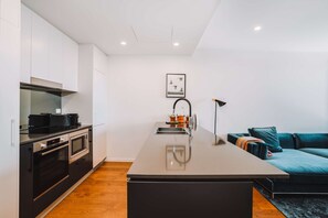 Apartamento | Cozinha privada | Talheres/pratos/utensílios de cozinha