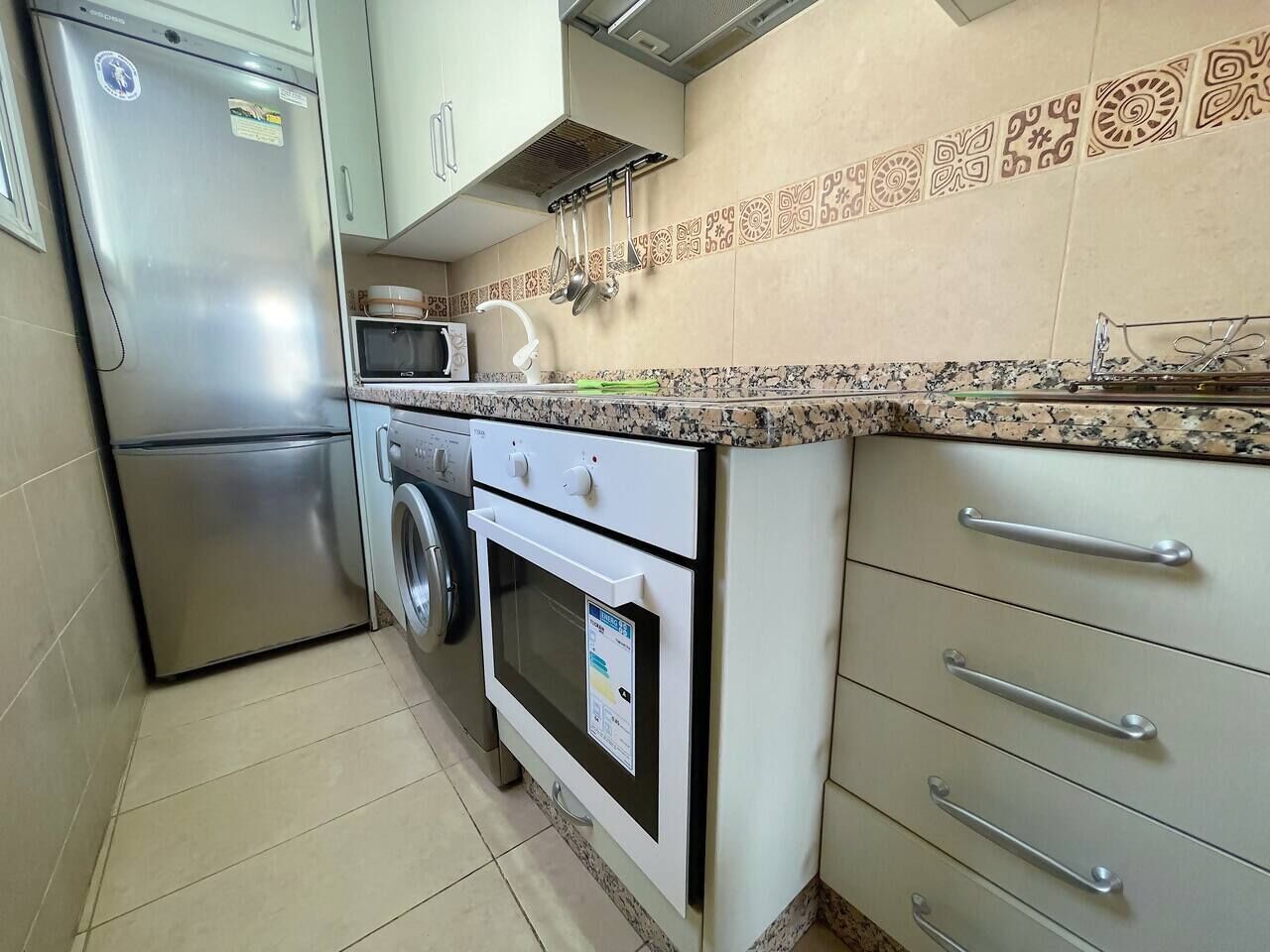 Fridge, microwave, oven, toaster