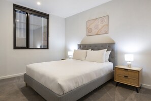 อพาร์ทเมนท์ | 2 ห้องนอน, พื้นที่ทำงานแบบใช้แล็ปท็อป, เตารีด/โต๊ะรีดผ้า, ผ้าปูที่นอน