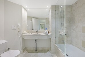 Apartment | Bathroom | Bathtub, hair dryer, towels, soap - Ocean View 2-bed Studio In the Heart of Surfers (Gold Coast)