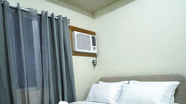 Unclassified image, 1 of 10, button - Room-cozy Modern Studio Overlooking the (Iloilo)