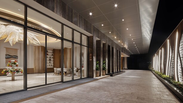 A modern hotel lobby with glass doors, a reception desk, and a seating area. - Fortune Select Siliguri - Member ITC Hotels' Group (Jalpaiguri)