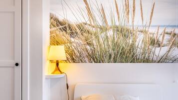 4 slaapkamers, een strijkplank/strijkijzer, internet