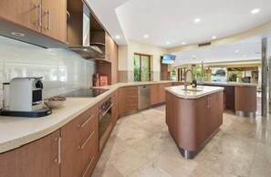 Private kitchen - RIVERSIDE RETREAT - A Tuscan Inspired Haven (Gold Coast)
