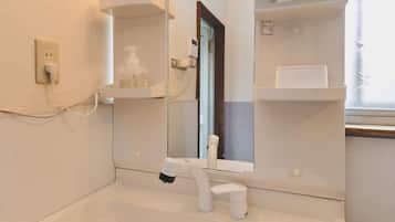 Hair dryer, bidet, towels, soap