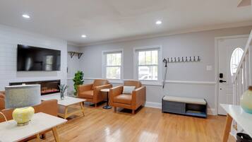 TV, fireplace, books