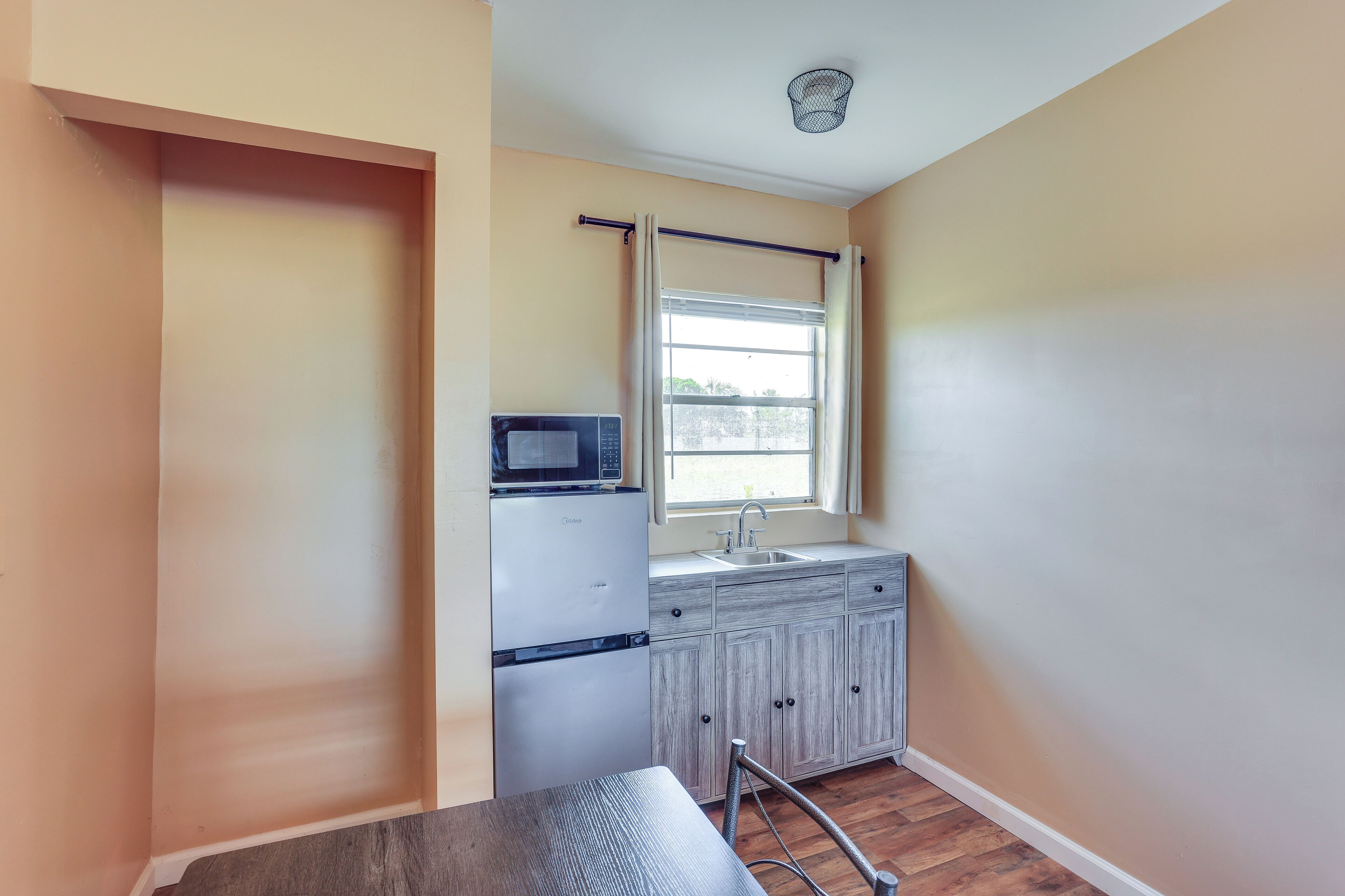 Fridge, microwave, dining tables