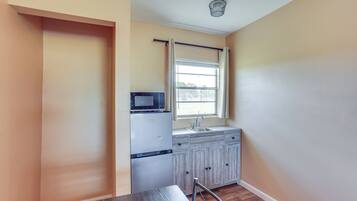 Fridge, microwave, dining tables