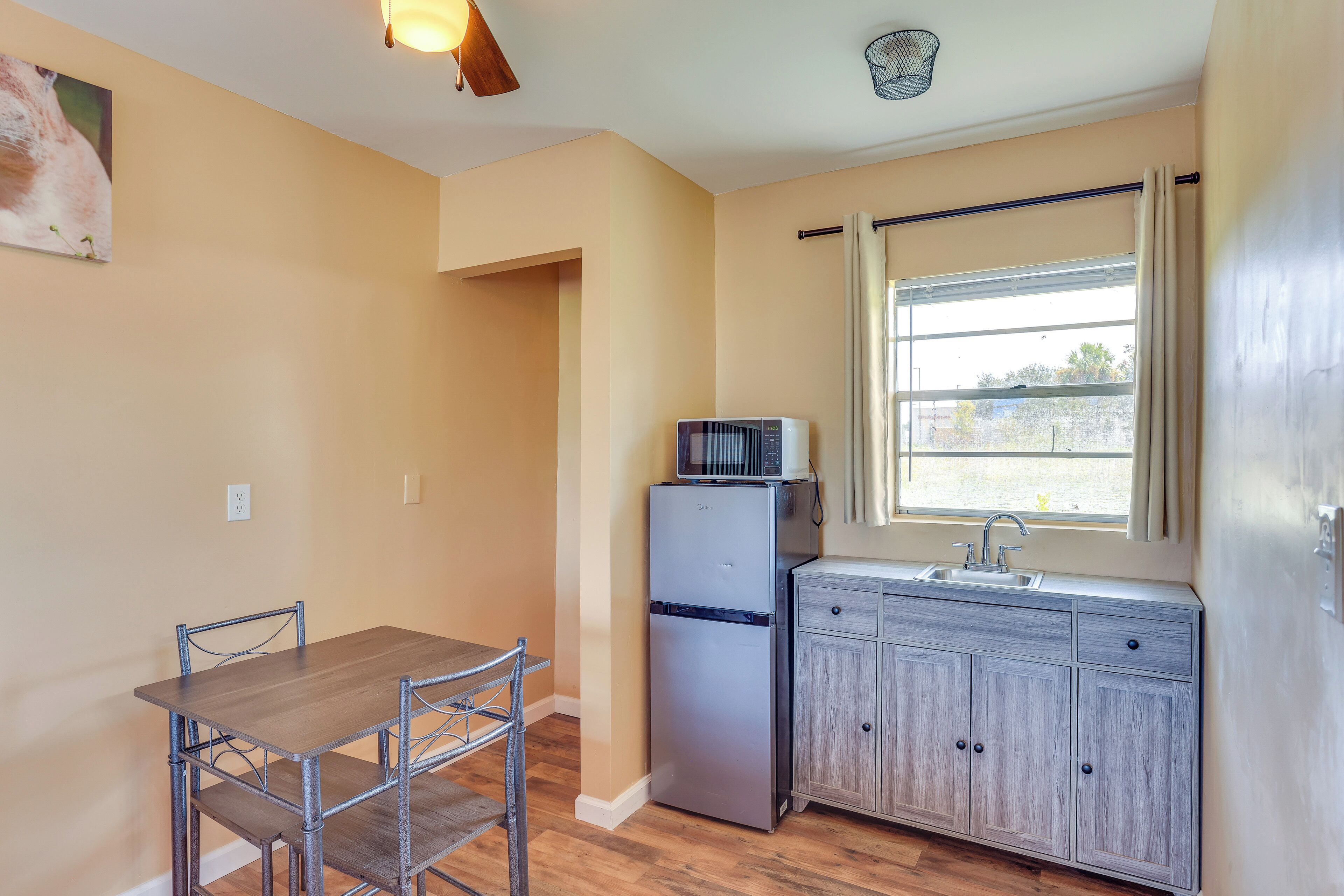 Fridge, microwave, dining tables