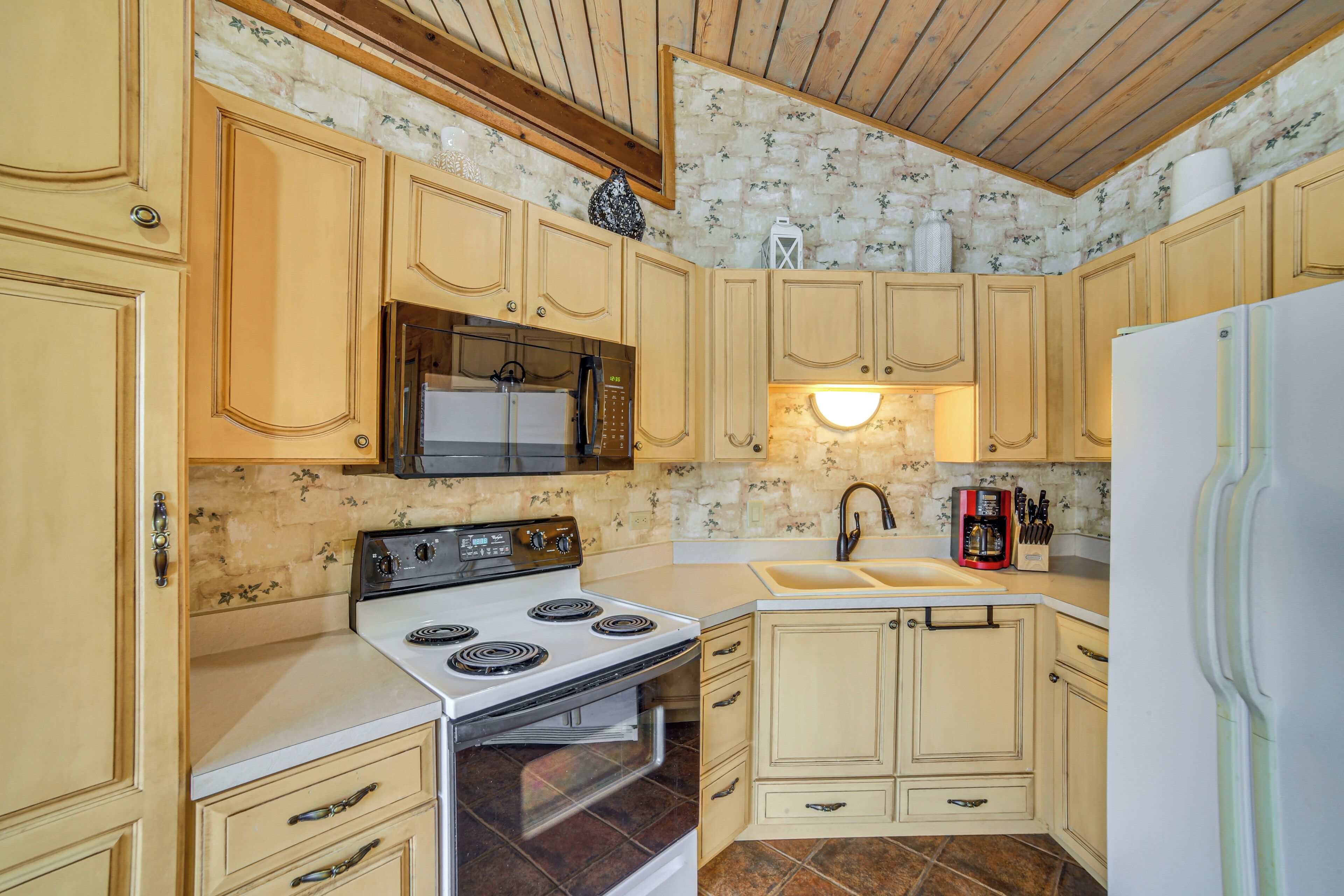 Fridge, microwave, stovetop, coffee/tea maker