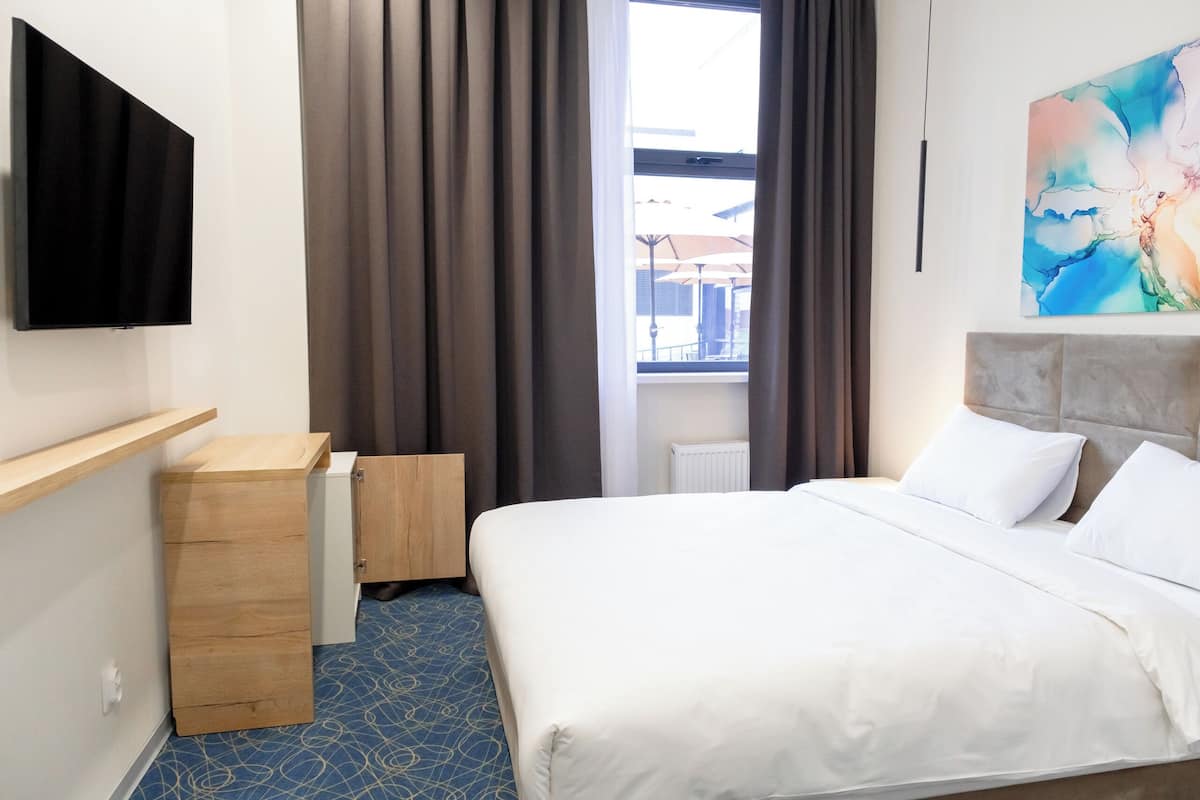 Habitación individual estándar, vista a la ciudad | Caja de seguridad en la habitación, insonorización y wifi gratis