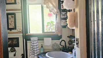 Shower, towels, soap, toilet paper